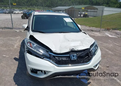 2016 Honda Cr-V Touring z USA, uszkodzony, nr VIN 5J6RM4H95GL118070